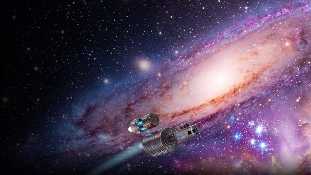Un vaisseau spatial évoquant l'univers de la comédie Dans une galaxie près de chez vous sur fond bleu-mauve dans le ciel